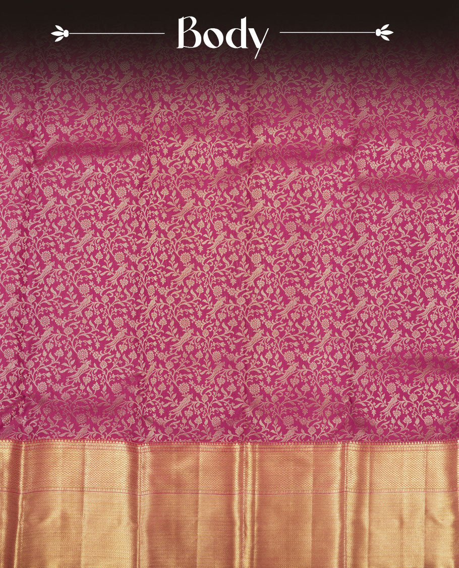 Magenta colour Kanchipuram pattern Manthrakodi saree featuring floral and peacock antique zari jacquard designs, traditional golden zari border and plain blouse piece with border.