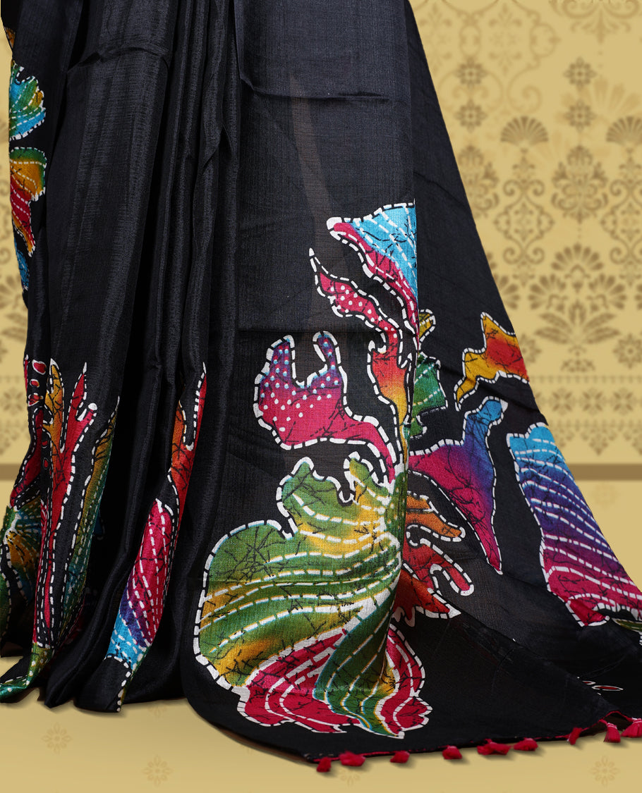 Black colour semi khadi silk saree adorned with yellow, green and magenta colour bold floral motifs across the body, designed without a border for a contemporary touch, and paired with a matching blouse.