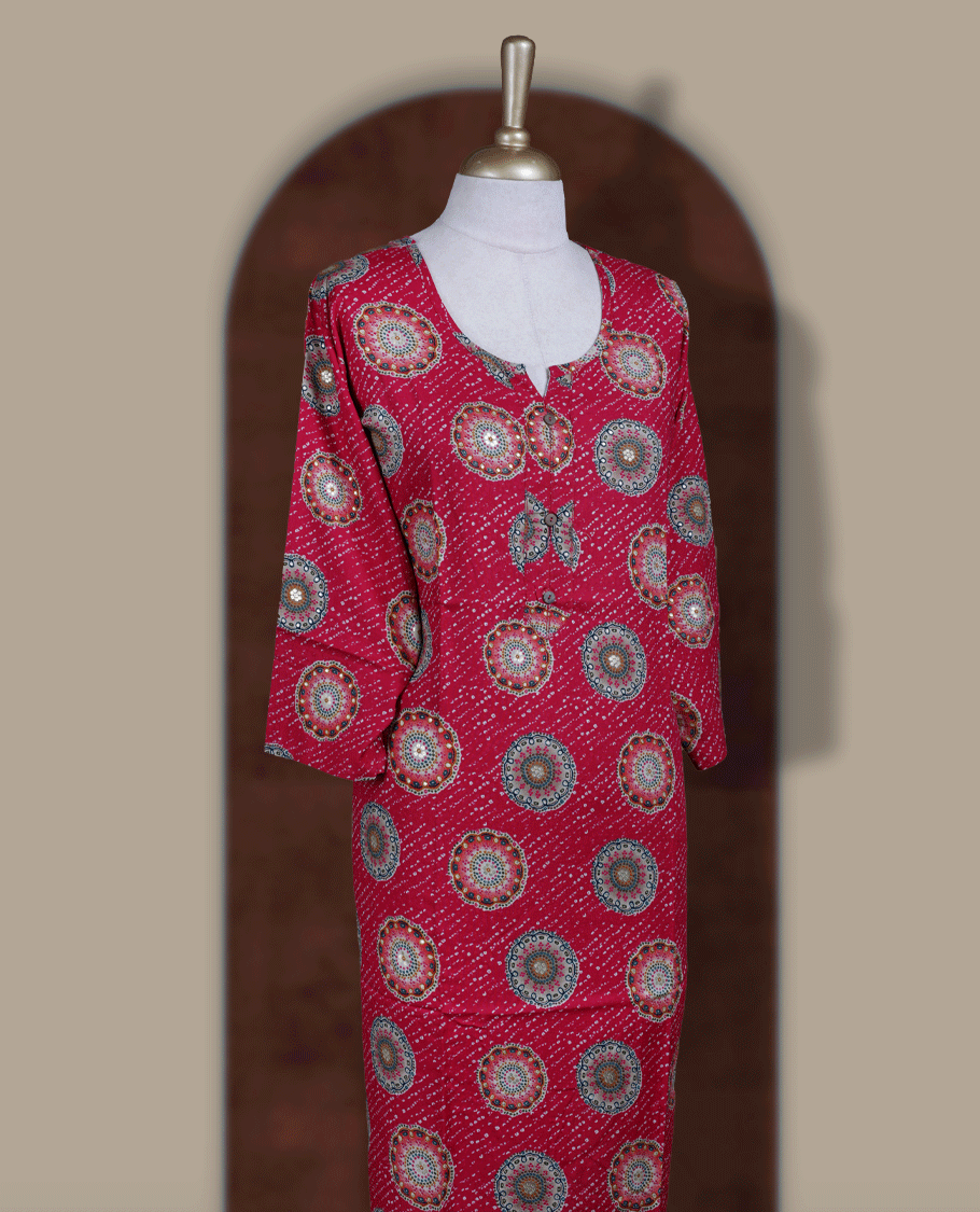 Magenta colour straight cut kurthi featuring elegant circular ethnic prints, styled with a round V notch neckline and comfortable 3/4th sleeves.