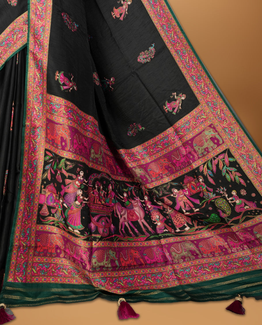 Black Pashmina Silk Saree with Intricate Embroidered Buti Work on Body, Detailed Multicolor Depictions of Royal Processions and Dancers on Vibrant Pink-Green Zari Border & Grand Pallu, Paired with Matching Blouse Piece