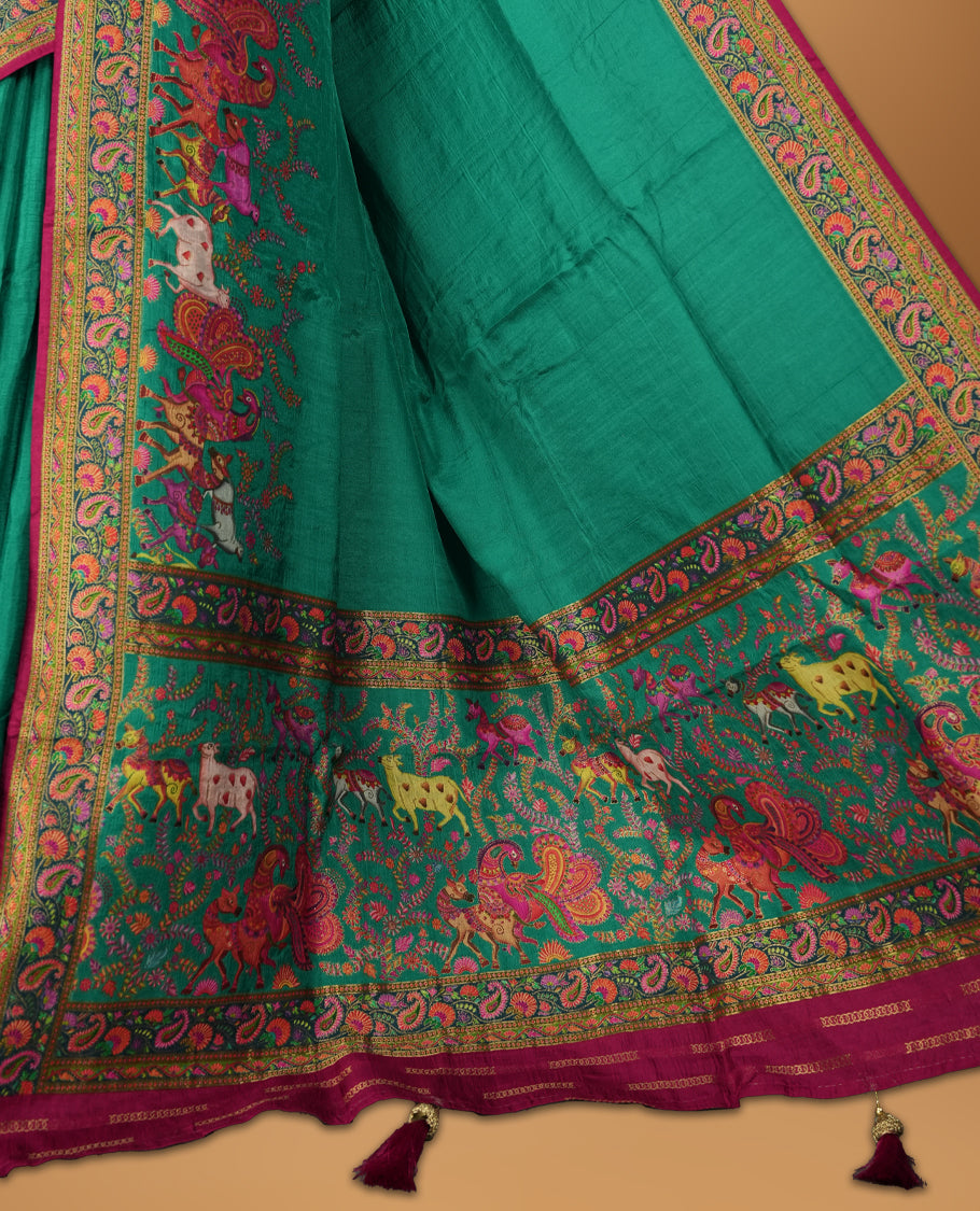 Teal Green Pashmina Silk Saree with Plain Body, Featuring Intricately Embroidered Multicolor Elephant and Peacock Motifs on Vibrant Pink-Gold Zari Border & Grand Pallu, Paired with Matching Blouse Piece