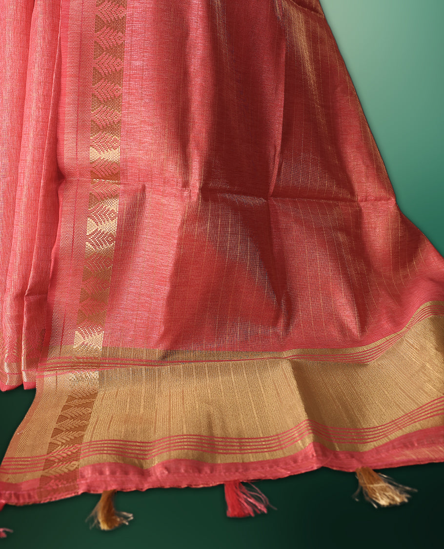 Peach Pink colour saree featuring subtle golden woven motifs on the body, complemented with a rich golden zari border and pallu, and paired with a matching blouse