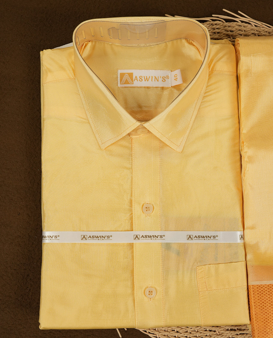 Champ colour Aswin’s wedding set featuring a refined silk shirt and matching dhoti with gold zari detailing, crafted for timeless elegance and perfect for traditional weddings and festive occasions.