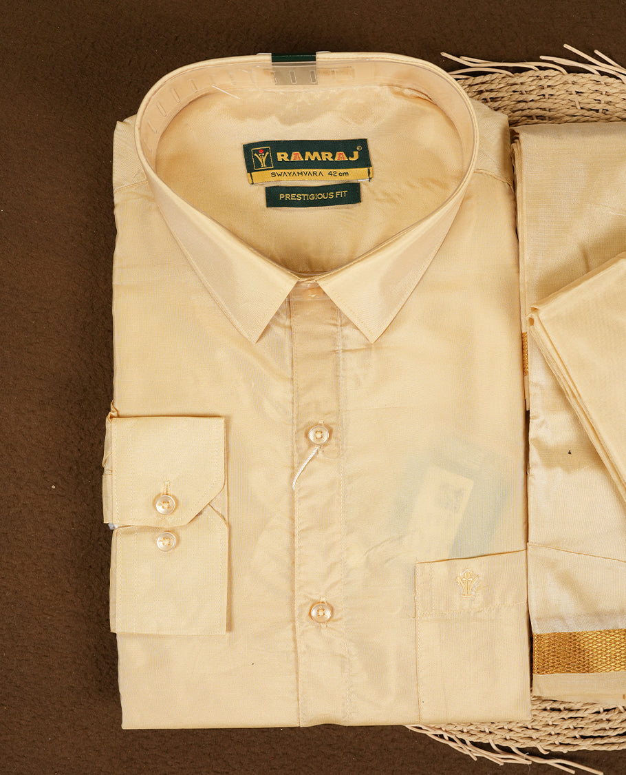 RAMRAJ Fresh Peach Colour shirt paired with a matching dhoti and towel, all elegantly finished with a gold border.
