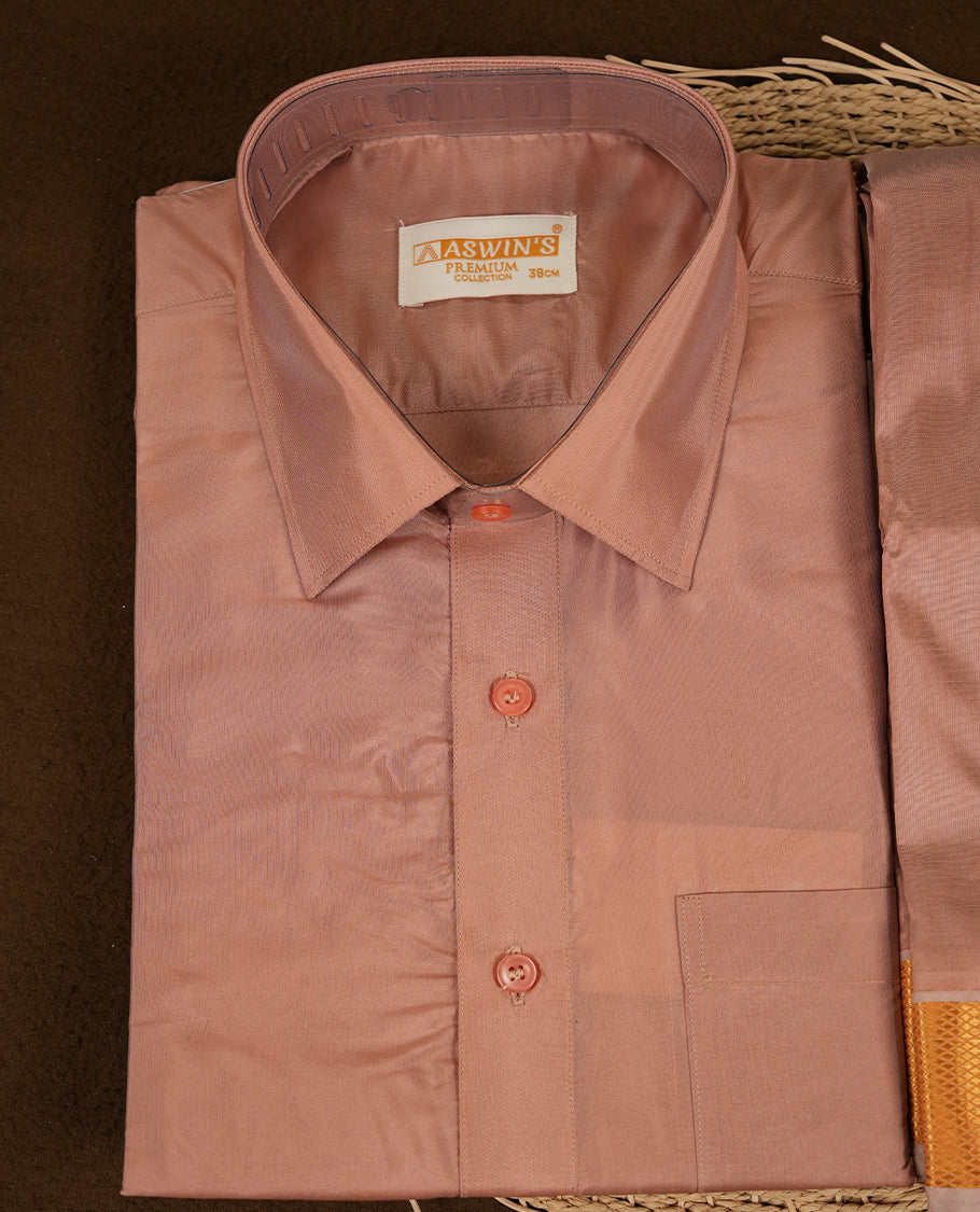 Copper colour Aswin’s wedding set featuring a refined silk shirt and matching dhoti with gold zari detailing, crafted for timeless elegance and perfect for traditional weddings and festive occasions.