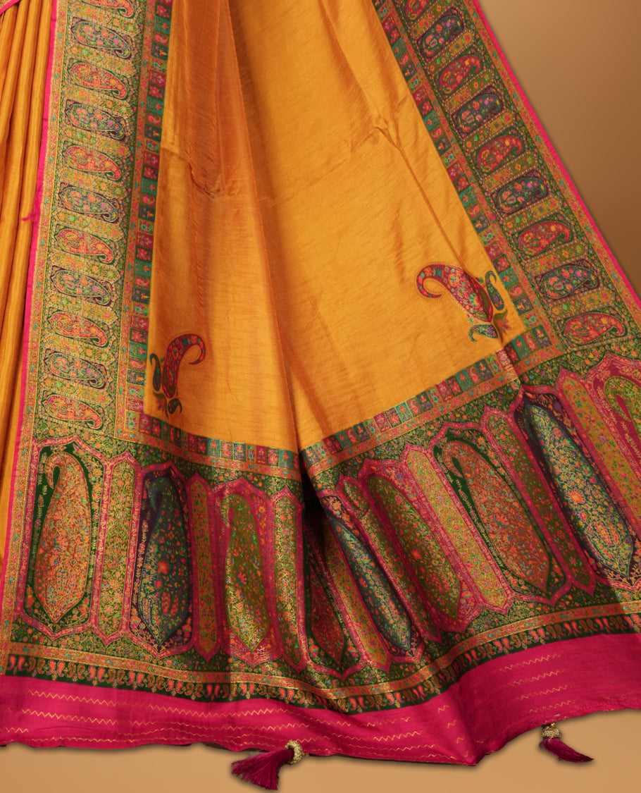 Orange Pashmina Silk Saree with Plain Body, Adorned with Intricate Multicolor Paisley and Floral Motifs on Elegant Pink-Green Zari Border & Rich Pallu, Paired with Matching Blouse Piece