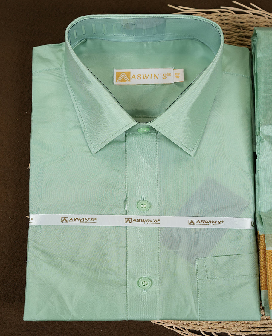 Pista colour Aswin’s wedding set featuring a refined silk shirt and matching dhoti with gold zari detailing, crafted for timeless elegance and perfect for traditional weddings and festive occasions.