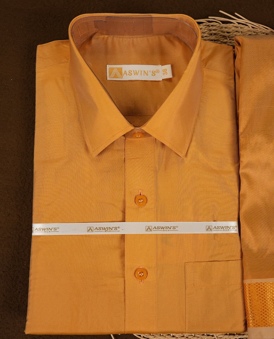 Gold colour Aswin’s wedding set featuring a refined silk shirt and matching dhoti with gold  zari detailing, crafted for timeless elegance and perfect for traditional weddings and festive occasions.