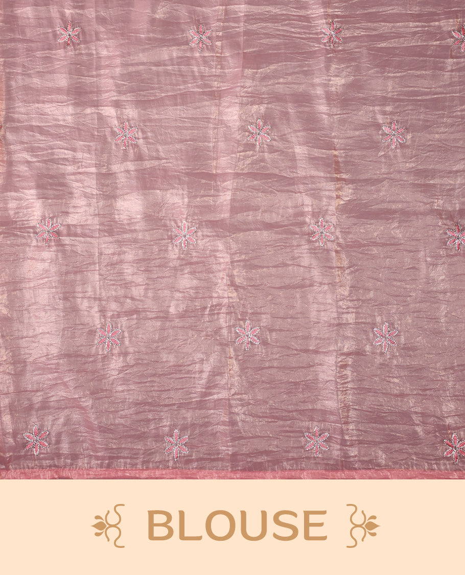 Peach colour crush soft silk saree adorned with bold floral thread embroidery on the body and scallop edged borders, Paired with a matching blouse for a complete look.