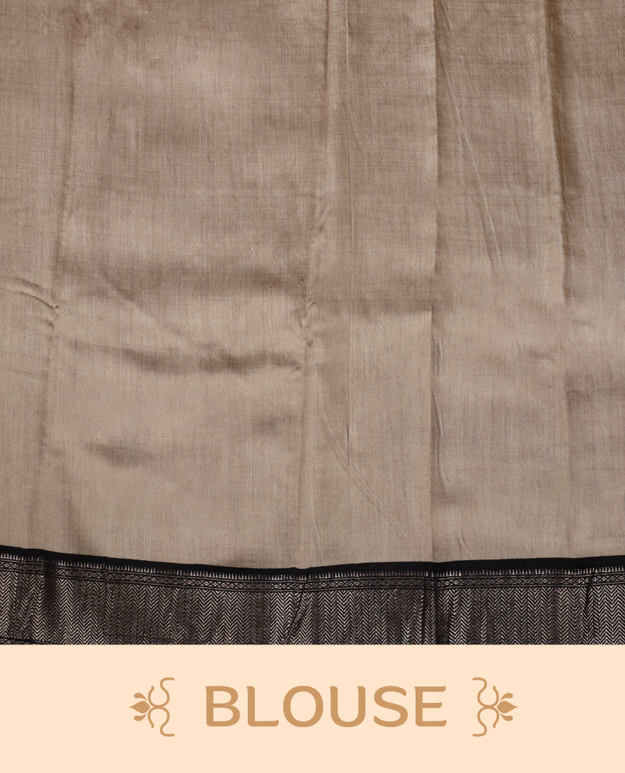 Beige colour saree adorned with bold black floral prints and a rich black zari border and stripped checkered pallu & Comes with a matching blouse piece.