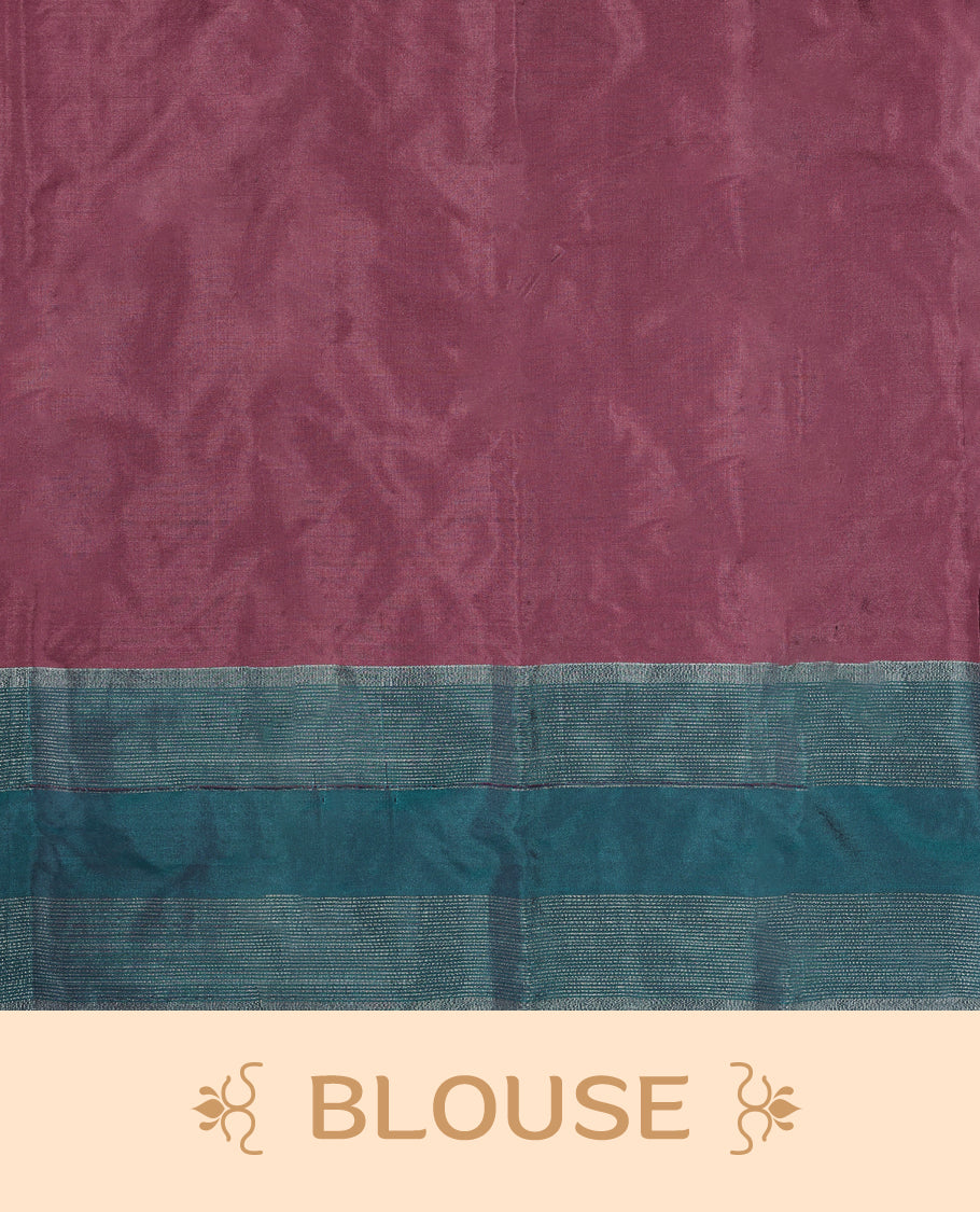 Onion coloured semi silk saree features silver zari motifs and is paired with a contrasting teal blue and silver zari border, with a matching blouse.