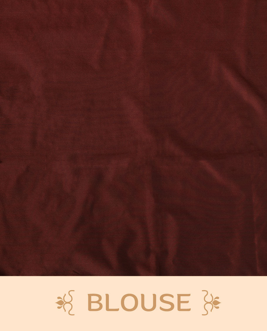 Deep red colour semi soft silk saree adorned with delicate woven floral kodi motifs on the body, complemented by a Self colour woven pallu with intricate detailing and tassel accents without border & Comes with a matching blouse piece.