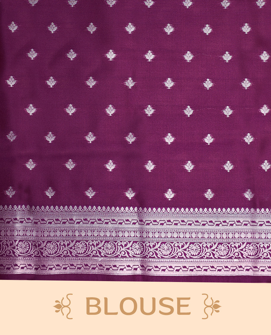 Light Onion coloured semi silk saree featuring a Silver coloured floral jaal design on the body, paired with a Grape coloured border and matching blouse.