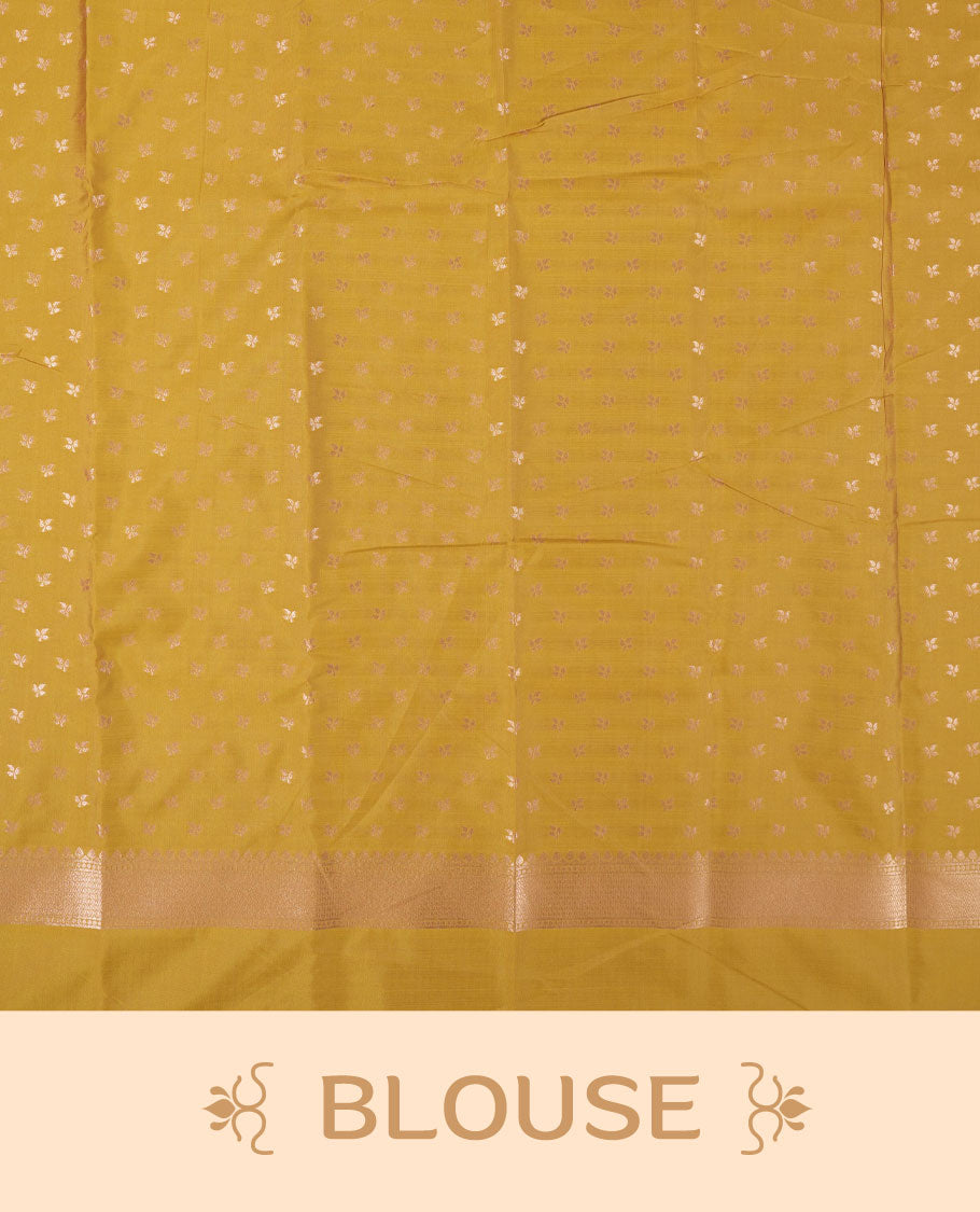 Mustard yellow colour semi silk saree adorned with elegant leaf motifs on the body, complemented by a shimmering golden zari woven pallu and border, and paired with a matching blouse
