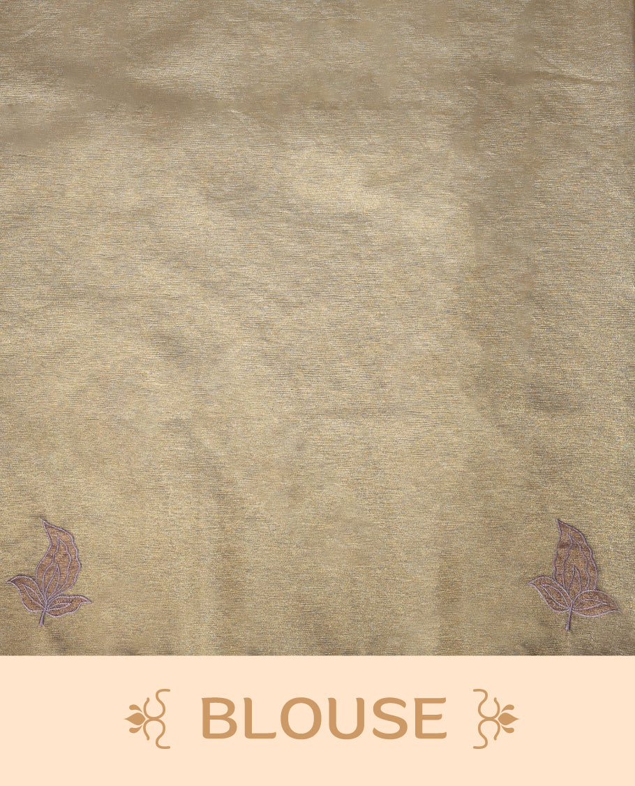 Champagne beige colour organza designer saree featuring subtle woven texture on the body, adorned with soft mauve floral embroidery along the border and pallu, finished with scalloped Thread edging paired with matching blouse.