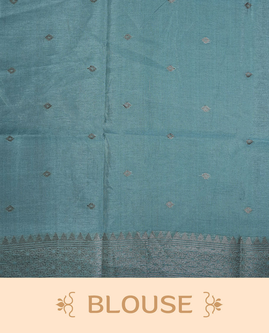 Blue color semi tussar Banarasi saree featuring vibrant multi-color floral prints across the body, with geometric zari patterns, and a matching blouse detailed with silver woven buttas.