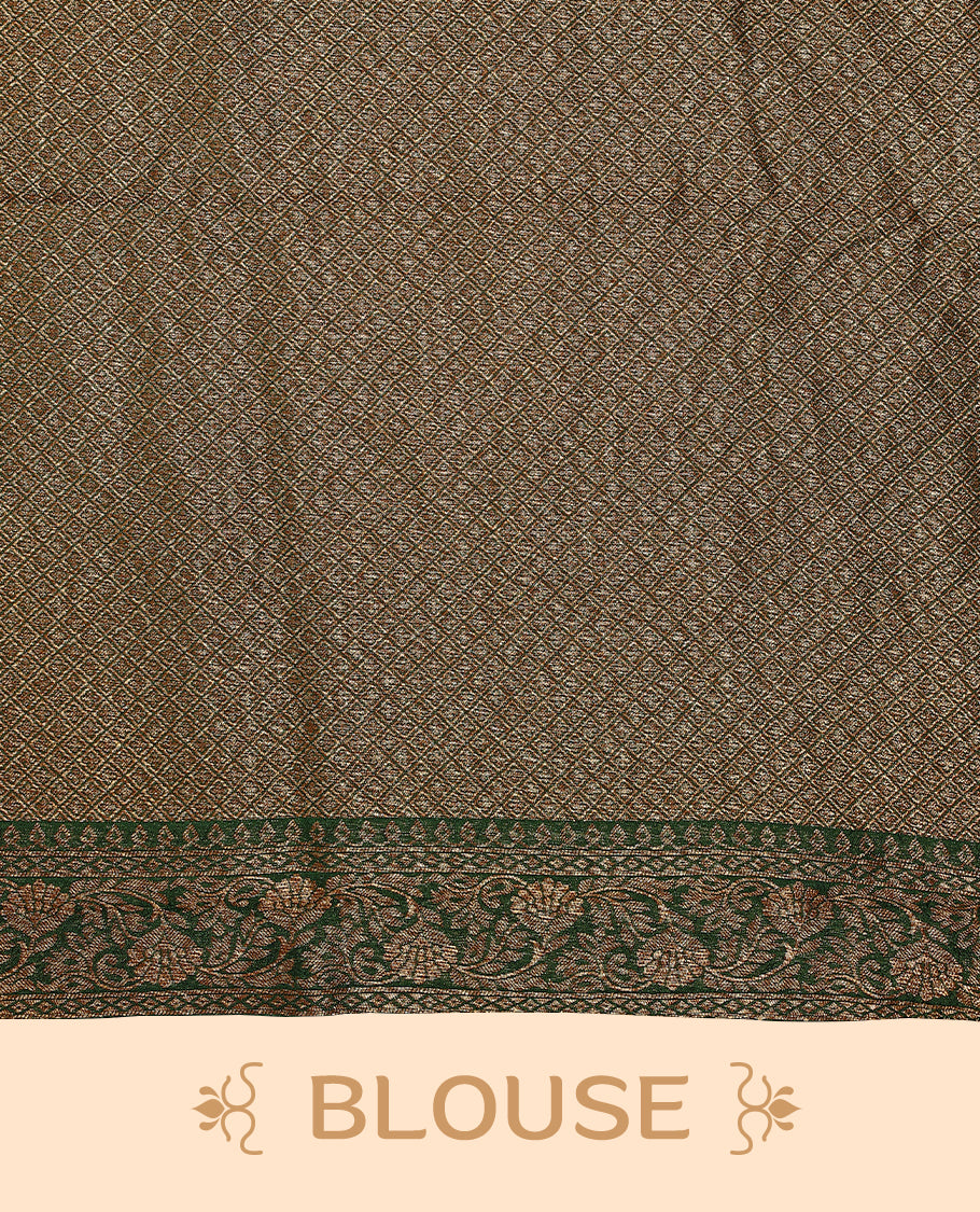 Dark Green colour semi Banaras tussar georgette saree embellished with antique zari flower motifs across the body, complemented by a rich Banaras border and paired with a matching blouse.
