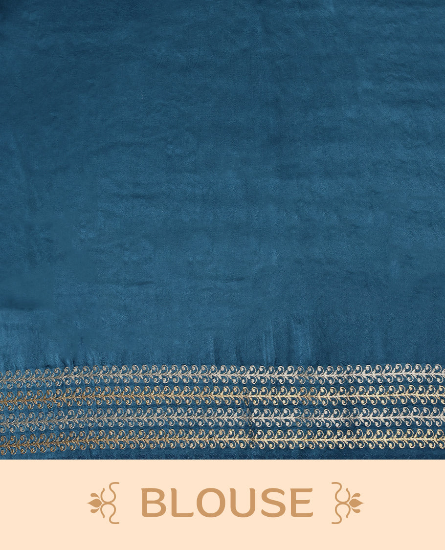 Blue colour pure Banaras crepe saree showcases elegant silver zari Flower Motifs all over the body, a traditional Banarasi gold zari border, a rich intricately woven pallu, and comes with a matching blouse.