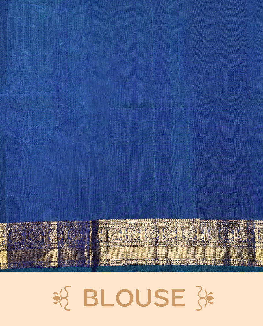 Peacock blue colour pure Kancheepuram saree with gold zari symmetrical motifs, traditional border with peacock and chakra designs, grand pallu with diamond motifs, and matching blouse.
