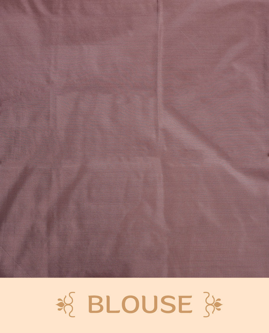 Pinkish beige colour semi soft silk saree adorned with delicate woven floral motifs on the body, complemented by a Self colour woven pallu with intricate detailing and tassel accents without border & Comes with a matching blouse piece.