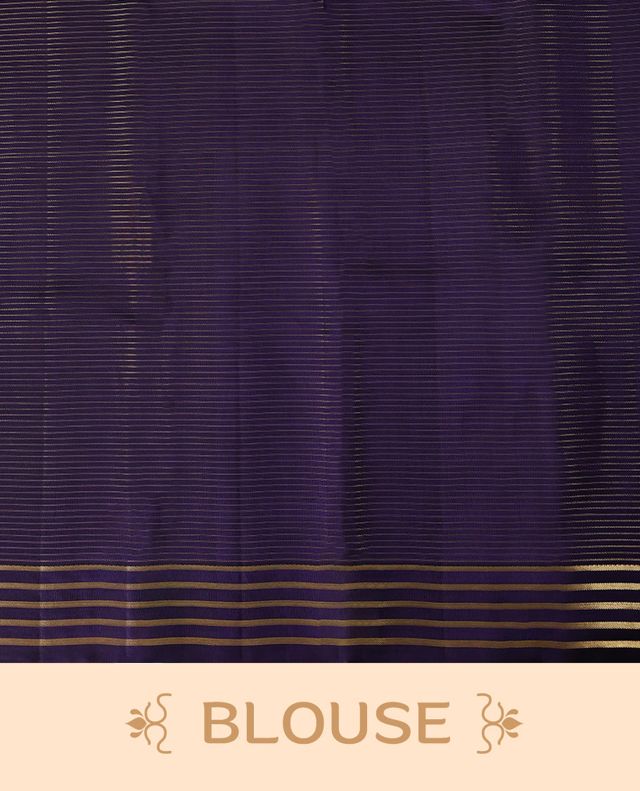 Dark purple Colour soft silk saree adorned with antique zari work, featuring a self-coloured floral border and paired with a matching blouse.