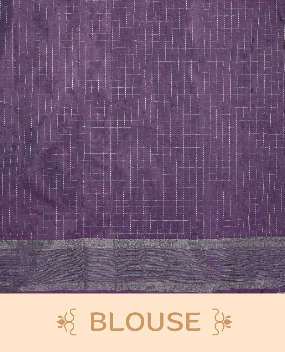 Dusty purple colour semi silk saree featuring silver checkered weave patterns on the body, complemented by a sleek silver zari border, and comes with a matching blouse.