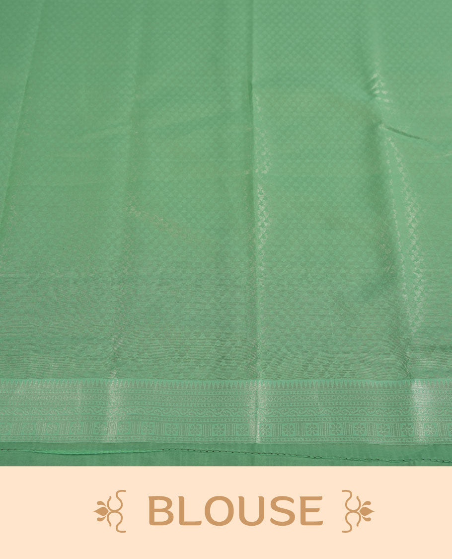 Light green colour semi silk saree adorned with silver leaf motifs on the body, complemented by a aqua green pallu intricately woven with rich floral patterns border and pallu, and paired with a matching blouse