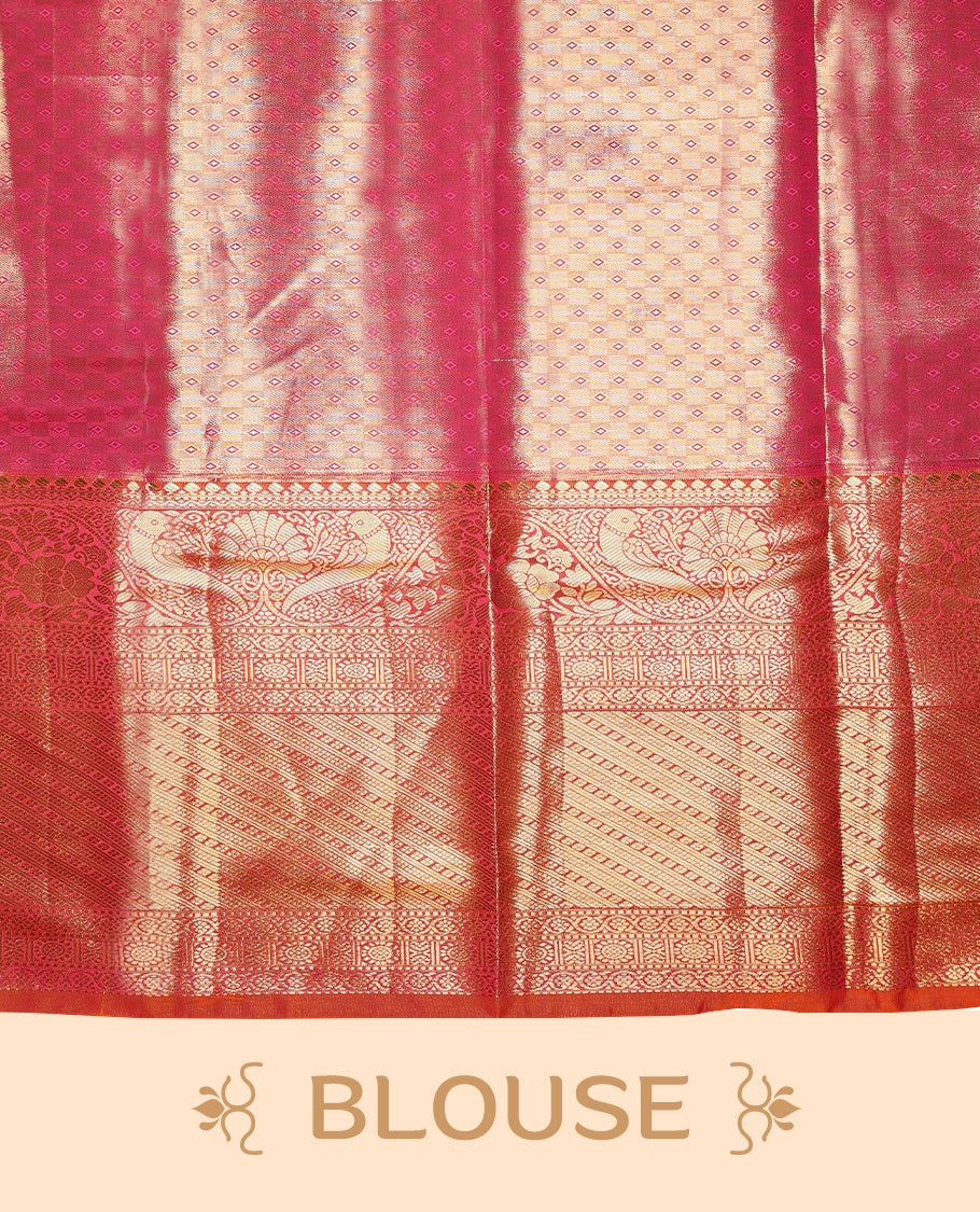 Gold colour tissue brocade saree with gold and silver zari floral kodi design on body, gold zari floral and peacock work pinkish orange border, rich matching pallu with Antique zari motifs, paired with matching blouse.