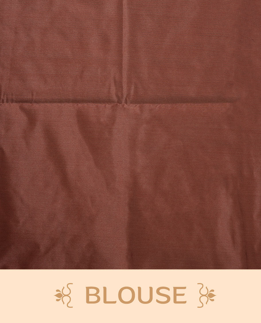 Brick colour semi soft silk saree adorned with delicate woven floral kodi motifs on the body, complemented by a Self colour woven pallu with intricate detailing and tassel accents without border & Comes with a matching blouse piece.