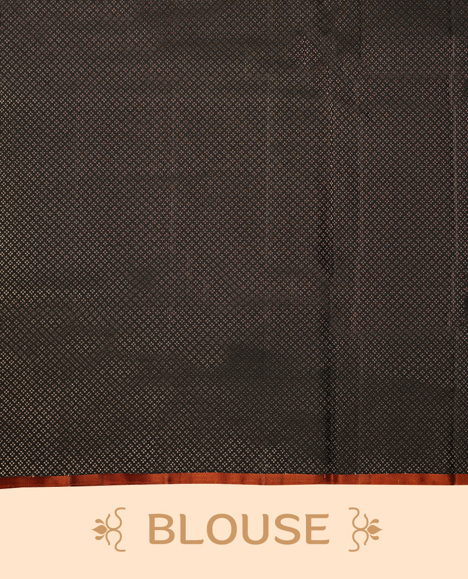 Deep black colour pure Mayuri silk saree featuring finely woven Golden zari motifs across the body, detailed with a subtle geometric self border with intricate texture, with matching blouse