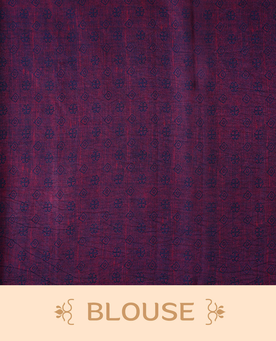 Blue Colour Manipuri saree features a brick patterned body in olive and indigo hues, beautifully offset by a contrasting magenta border with copper floral-printed, and comes with a matching blouse.