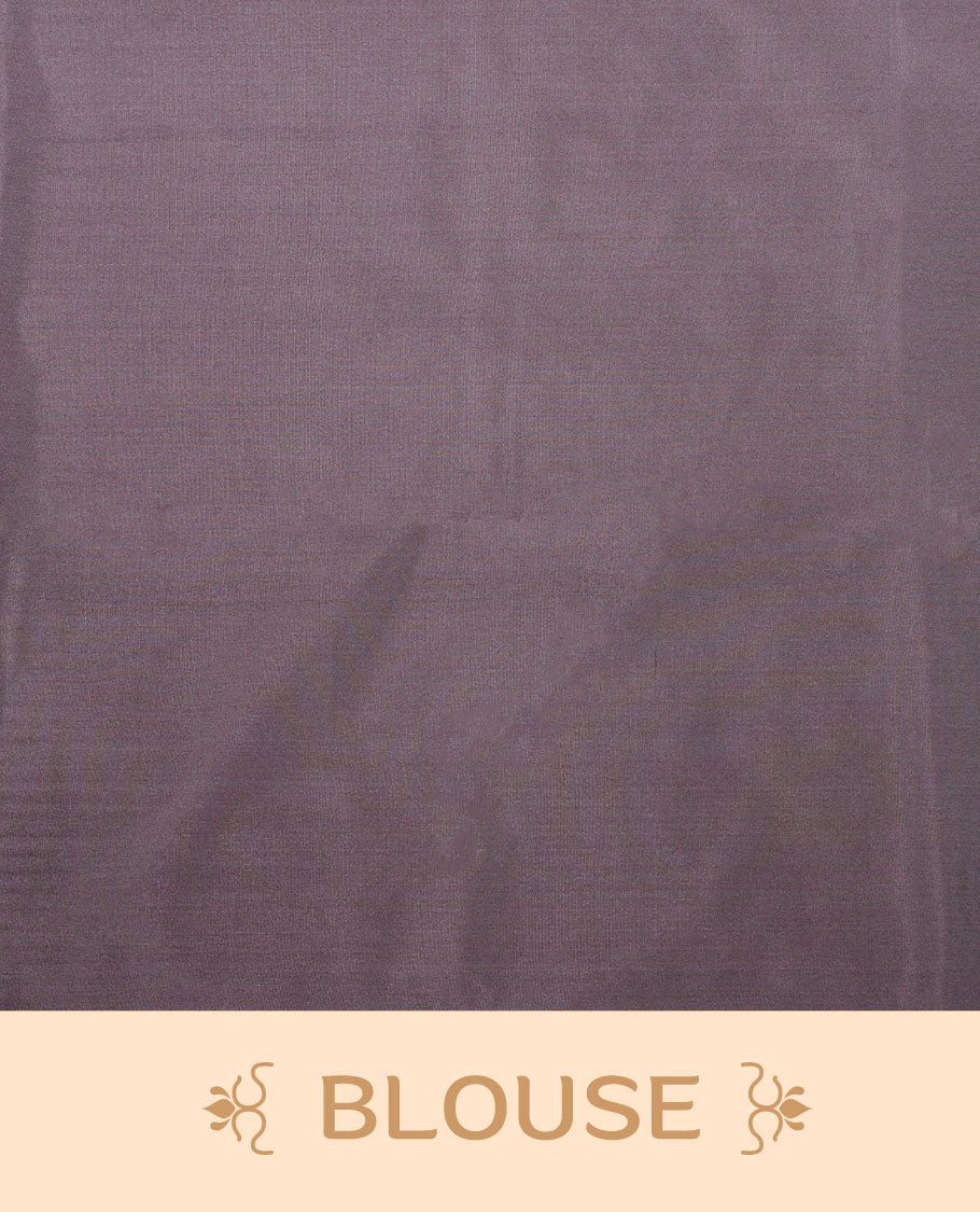 Pinkish gray colour semi soft silk saree adorned with delicate woven floral kodi motifs on the body, complemented by a Self colour woven pallu with intricate detailing and tassel accents without border & Comes with a matching blouse piece.