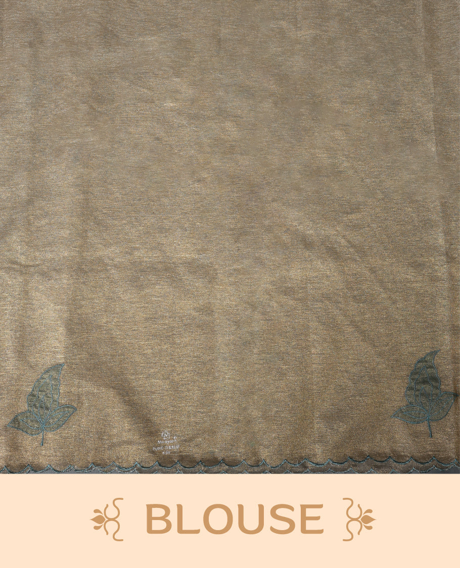 Champagne beige colour organza designer saree featuring subtle woven texture on the body, adorned with soft Blue floral embroidery along the border and pallu, finished with scalloped Thread edging paired with matching blouse.