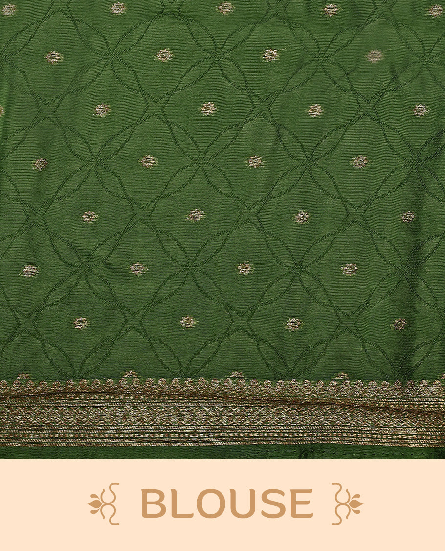 Green double shade semi Banaras Tussar Georgette saree adorned with elegant antique gold zari floral motifs across the body, featuring a detailed woven border and grand pallu, paired with a matching blouse piece.