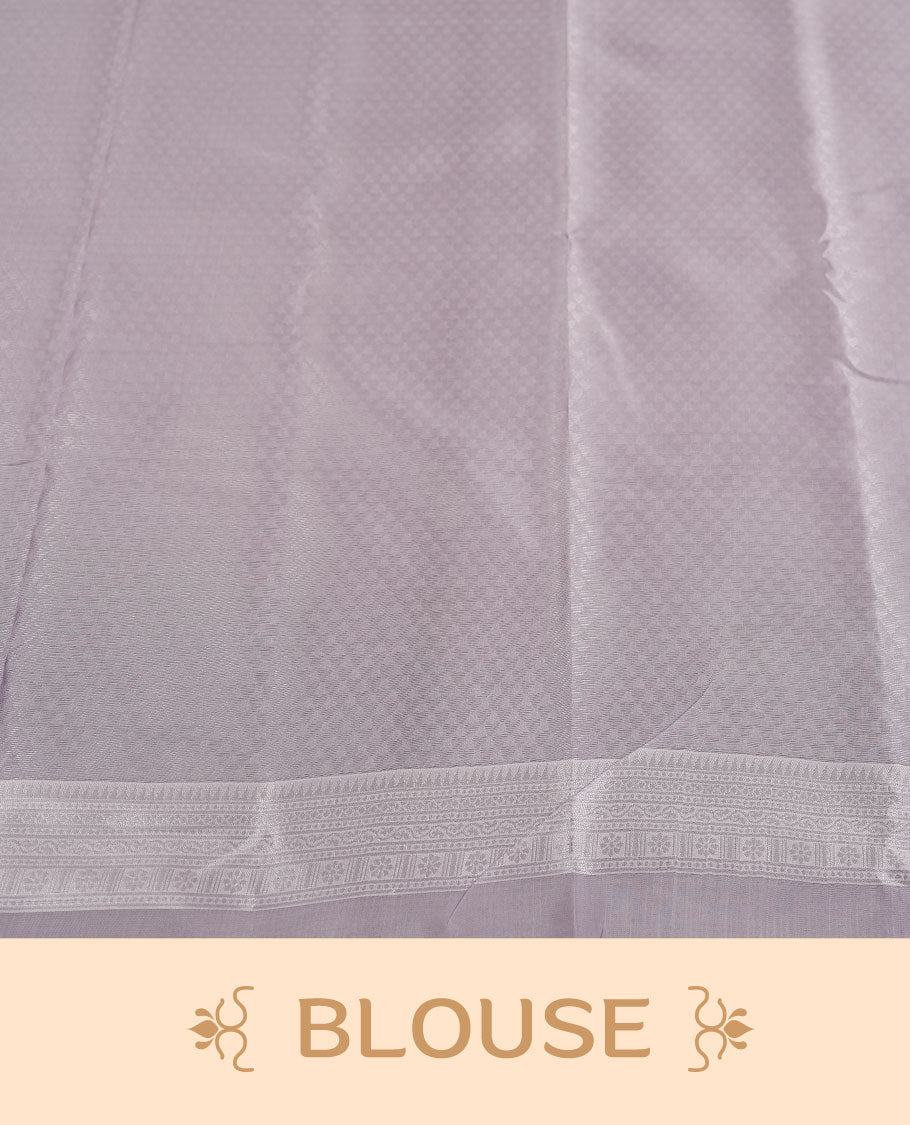 Sea Green colour Semi Silk Saree with Subtle Zari Butta Motifs on the Body, Contrasting Silver Zari Woven Pallu and Border with Intricate Patterns and Tassels, Paired with Coordinated Blouse Piece