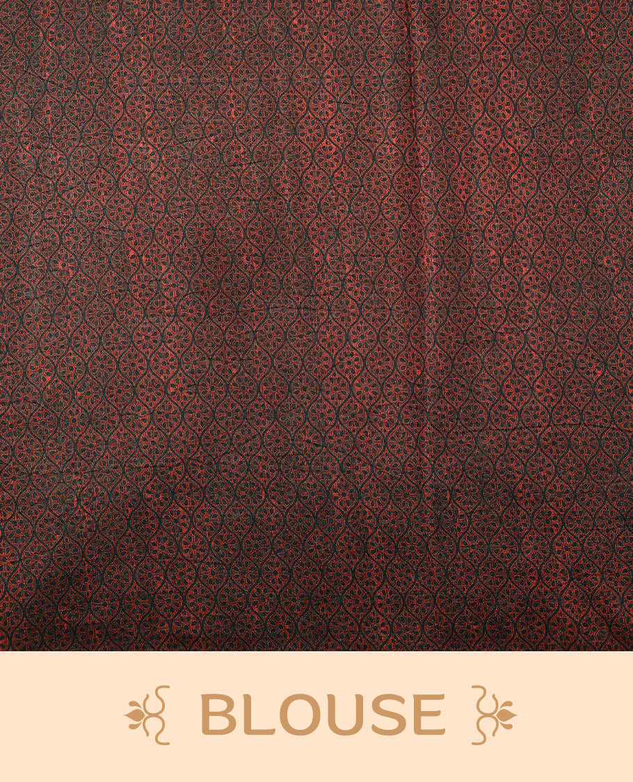 Dark colour Manipuri saree features a body filled with vibrant paisley and floral block motifs, accentuated by a multicolour floral printed border and paired with a matching blouse.