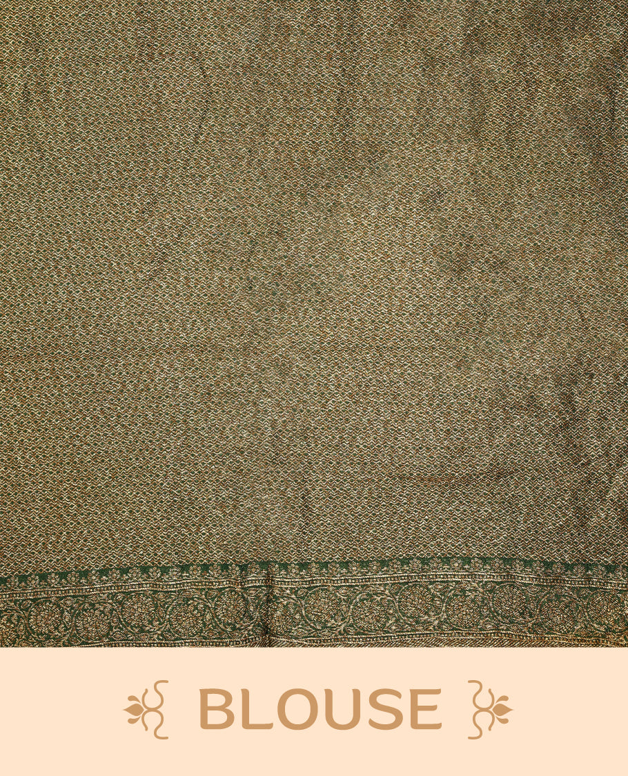 Deep green colour Banarasi Bandhani silk saree featuring light parrot green hand Bandhani patterns with intricate Banarasi motifs, complemented by antique zari woven border and grand pallu, paired with matching antique zari brocade blouse.