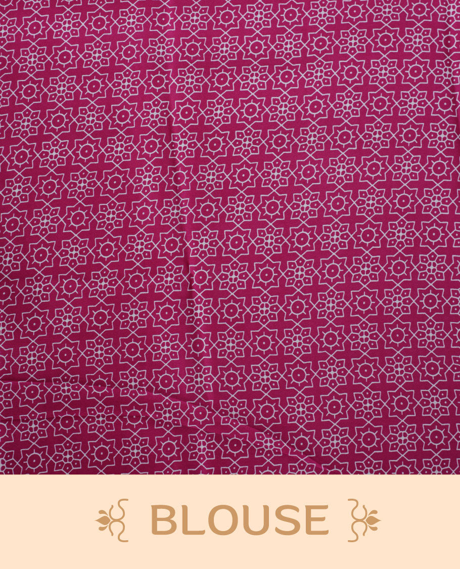 Dark Pink colour semi modal saree featuring bold white geometric borders and fine stripe detailing, finished with an oversized white circular motif on the pallu, paired with a matching printed blouse.