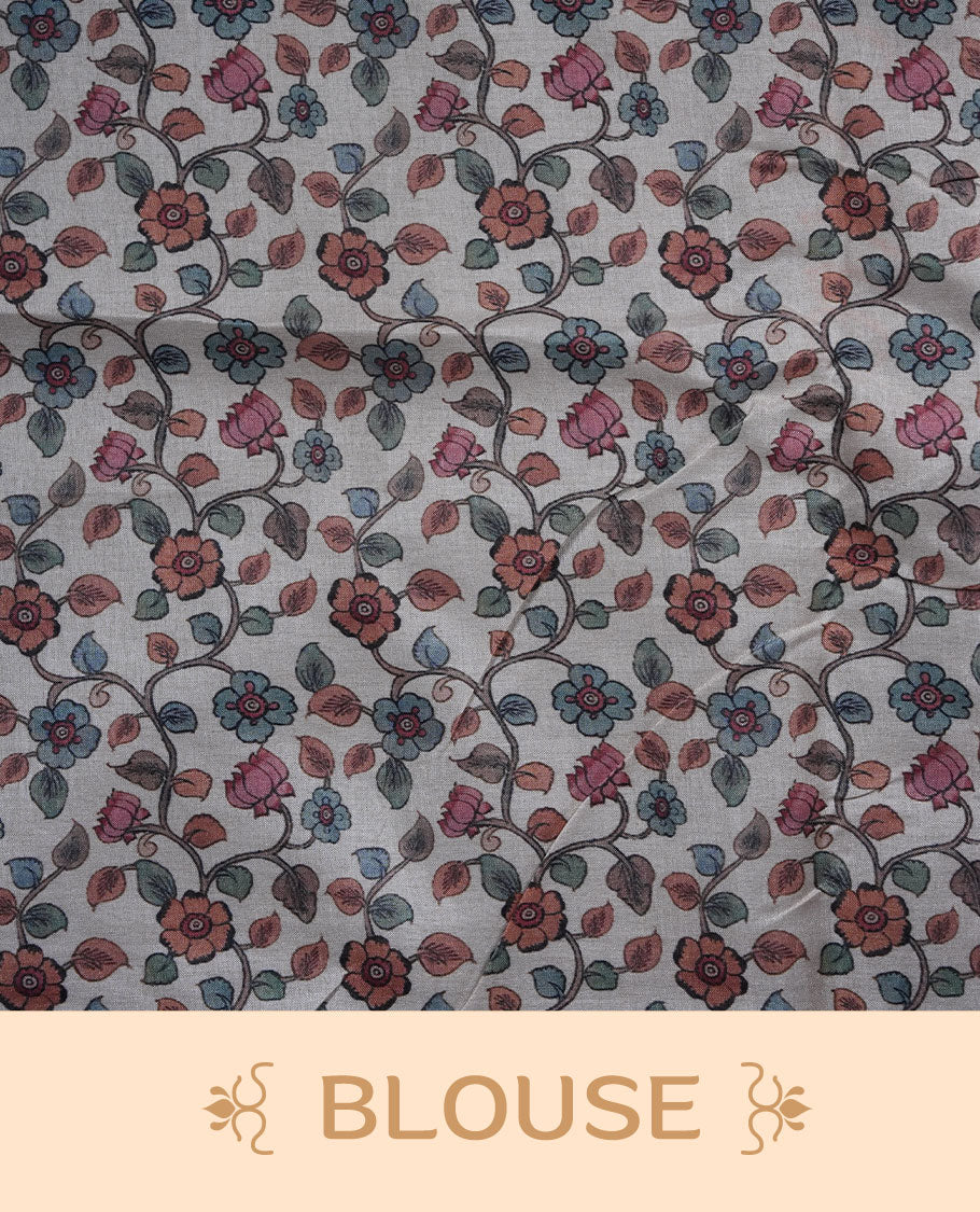 Georgia peach colour colour semi linen saree featuring hand-painted bird and floral motifs on the body, finished with a subtle gold border and paired with a matching floral print blouse.