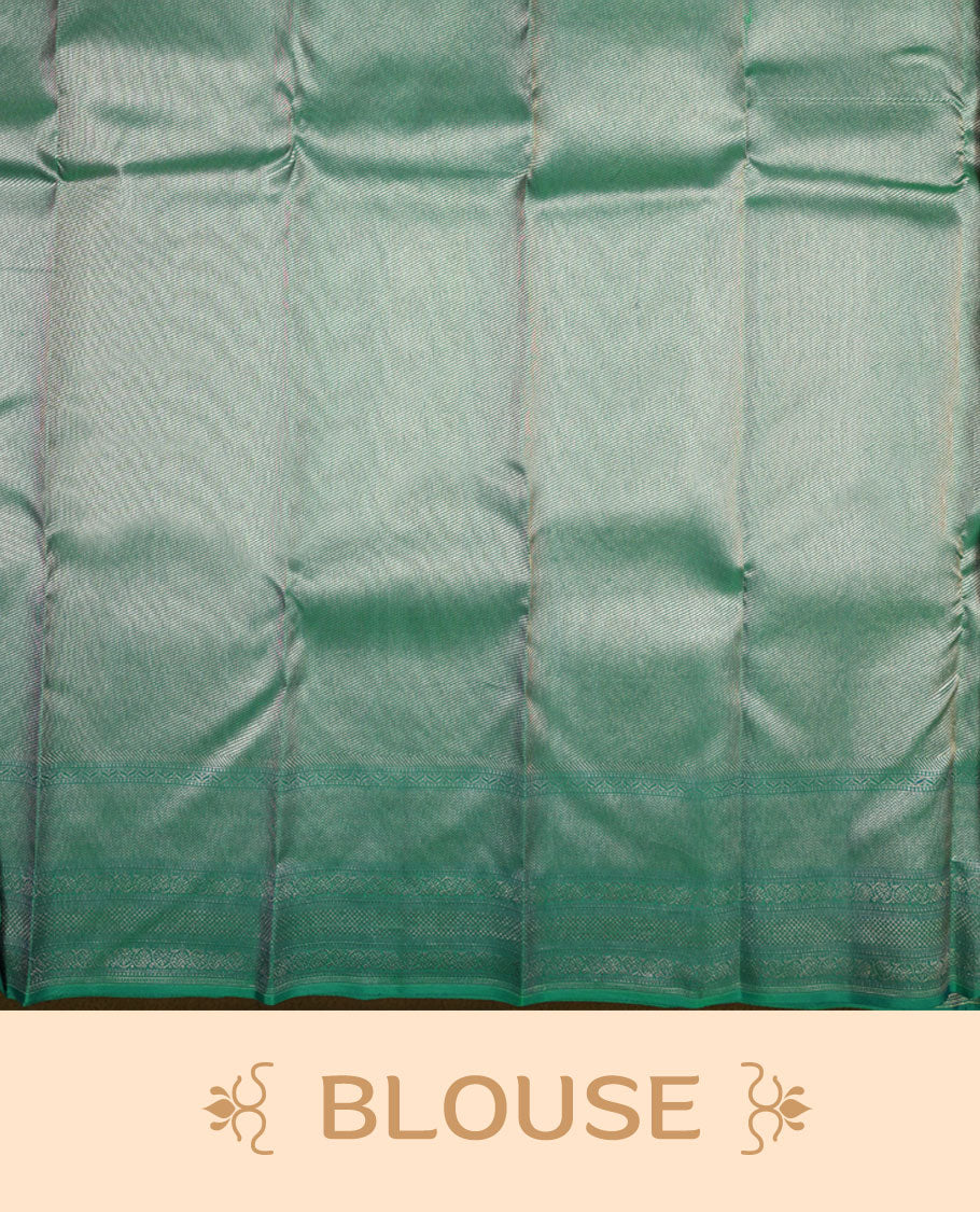 Peacock green colour Kanchipuram pattern Manthrakodi saree featuring floral and leaf motifs zari kodi antique gold jacquard kanchipuram traditional & zari turning border and zari jacquard blouse piece.