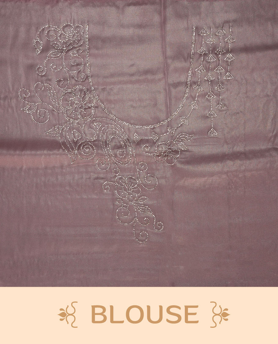 Pastel pink Colour net shimmer fancy saree adorned with white stone buttas with design over the body, paired with a delicate stone worked border and matching blouse