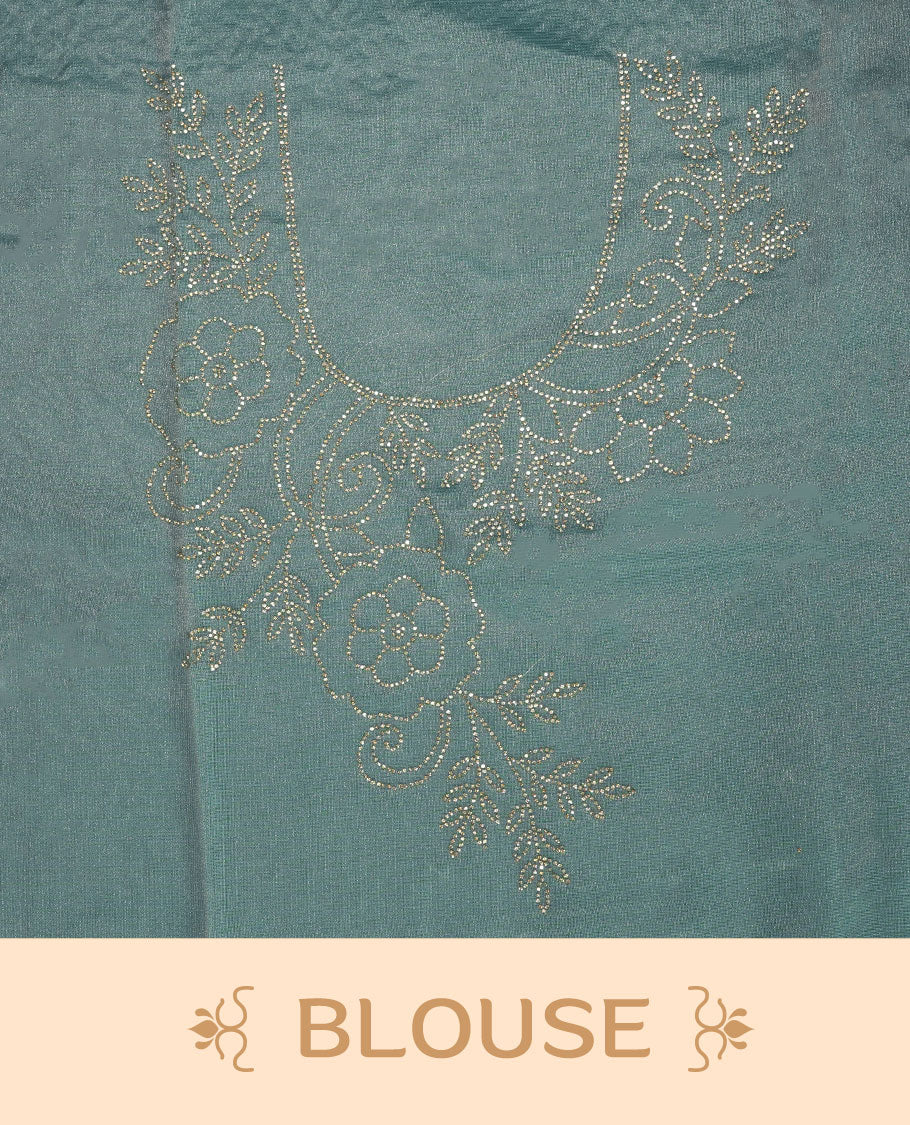 Pastel aqua blue  Colour net shimmer fancy saree adorned with scattered white stone buttas all over the body, paired with a delicate stone worked border and matching blouse featuring floral vine stone embroidery.