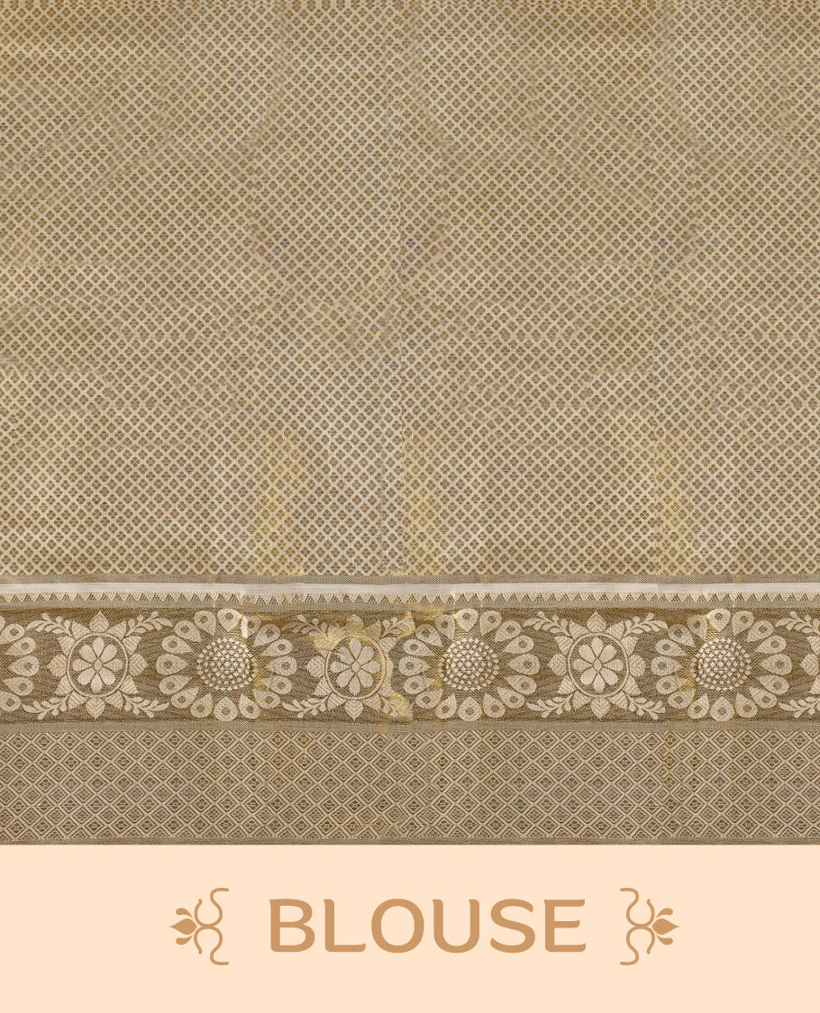 Elegant off white colour soft cotton Kerala saree adorned with golden floral motifs all over, accentuated by an ornate golden pallu with tassels, and a matching blouse, making it a perfect choice for traditional and festive celebrations.