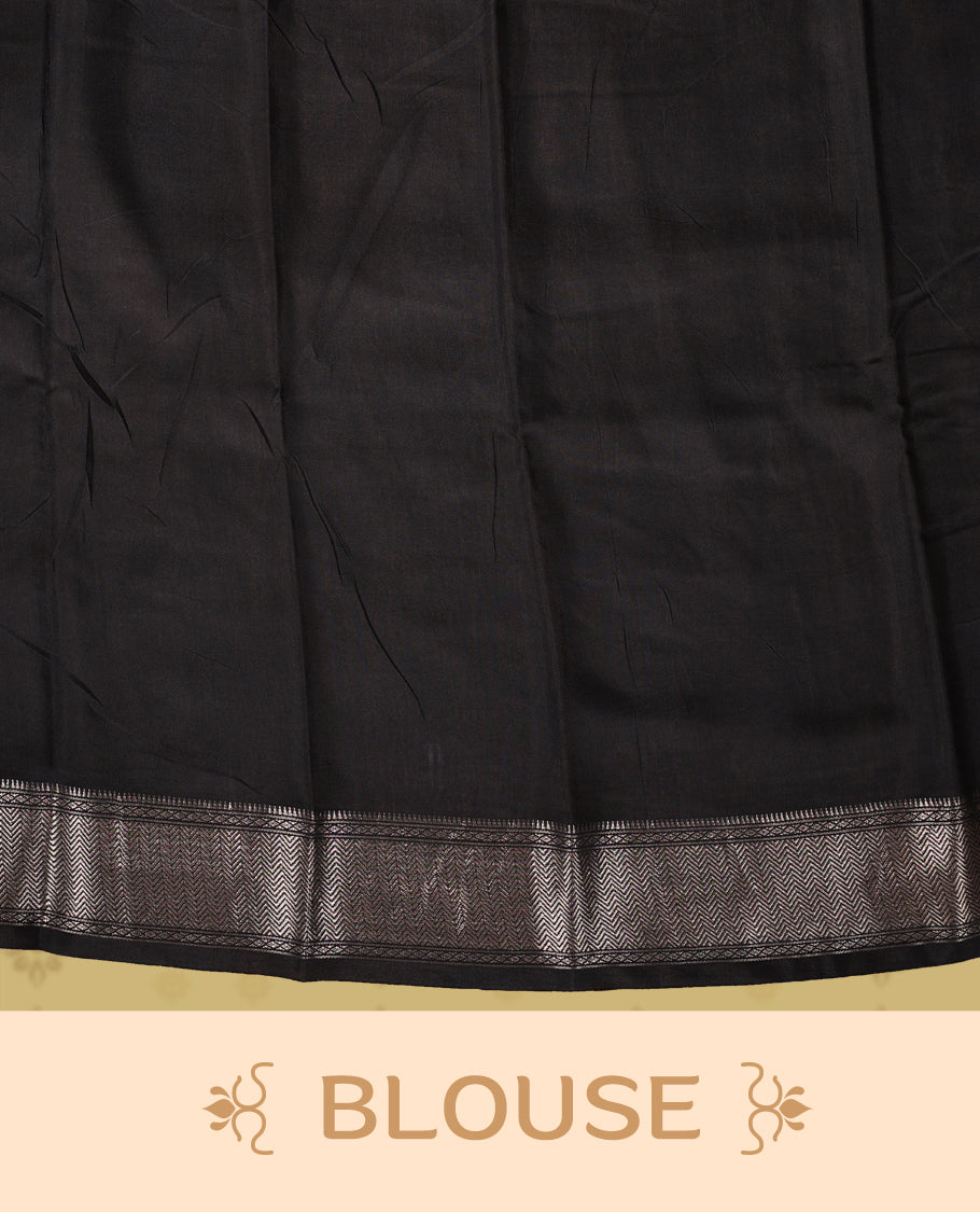 White colour saree adorned with bold black floral prints and a rich black zari border and stripped checkered pallu & Comes with a matching blouse piece.