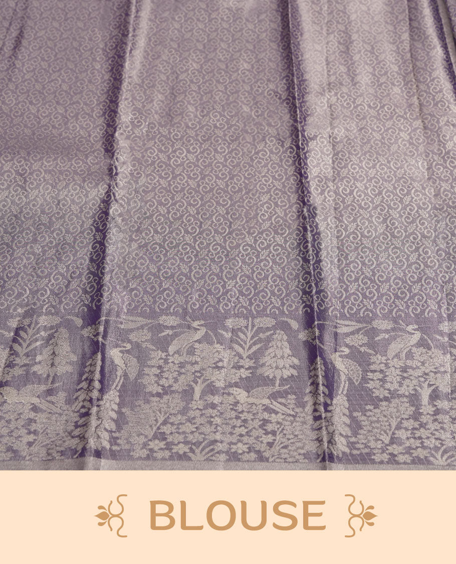 Aqua green colour and Antique gold Zari Tissue Brocade Saree features intricate Motifs on body and pastel purple colour fancy border & pallu with forest patterns, paired with matching blouse