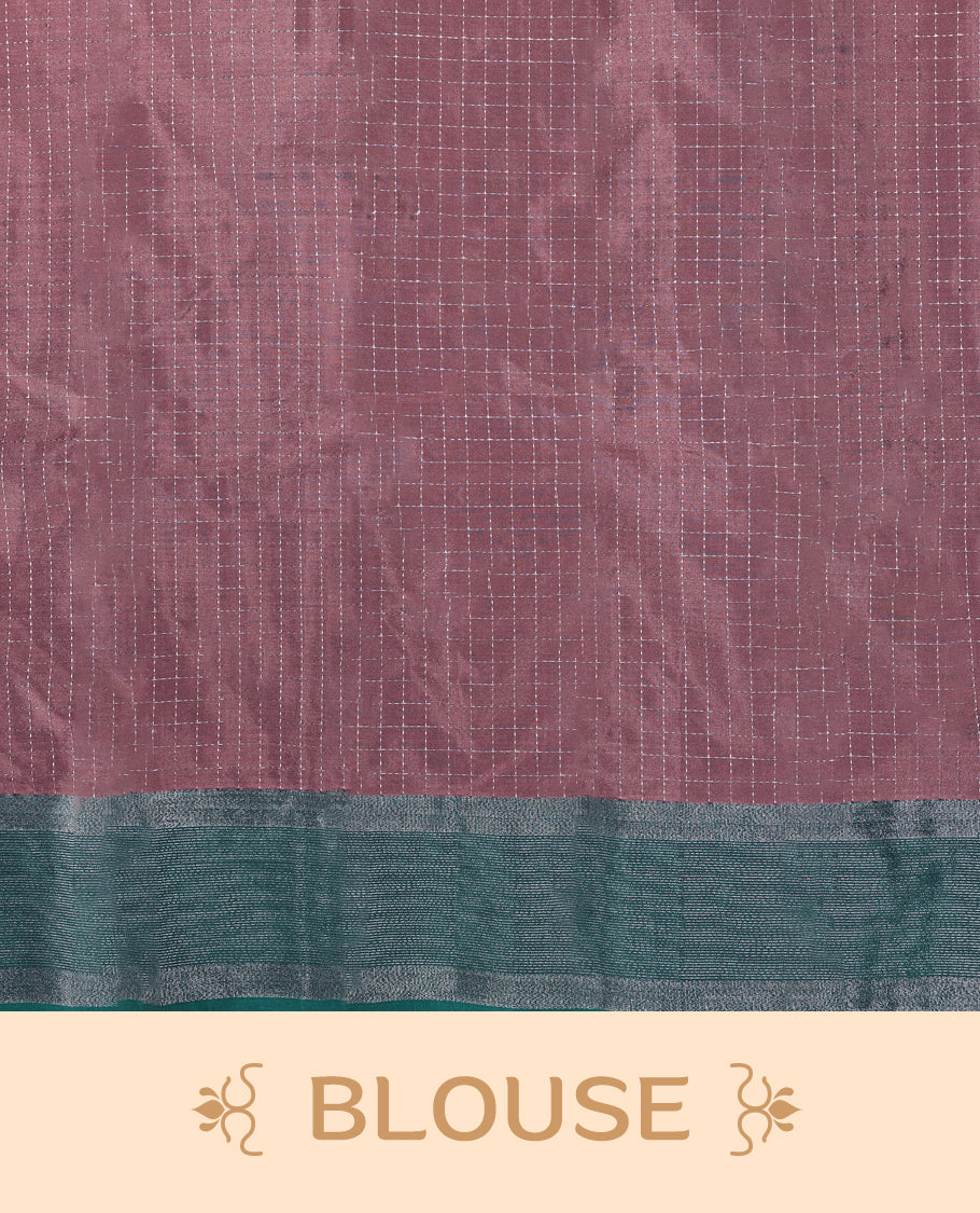 Pastel Brown colour body with delicate silver checks, paired with a contrasting green and silver zari border, comes with a matching blouse.