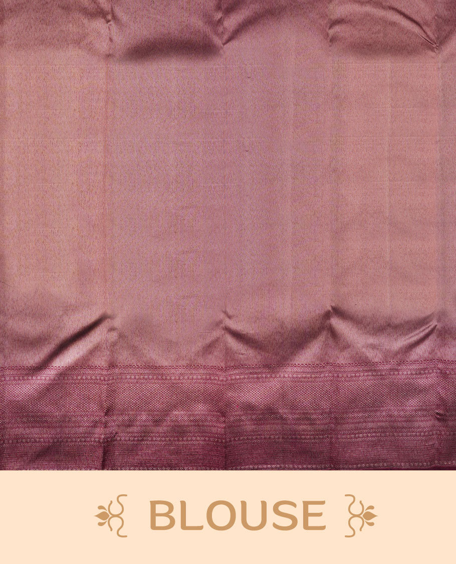 Dark wine colour Kanchipuram pattern Manthrakodi saree adorned with diamond antique gold zari jacquard on the body, highlighted by a rich geometrical pattern border and complemented with a self jacquard blouse piece.