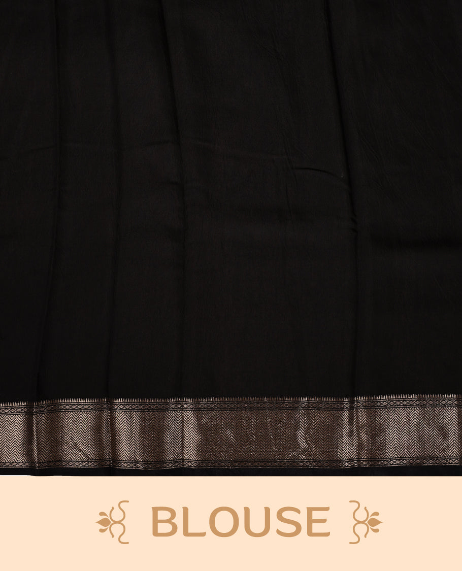 Black colour saree adorned with elegant white floral prints and a rich black zari border and rich stripped pallu & Comes with a matching blouse piece.