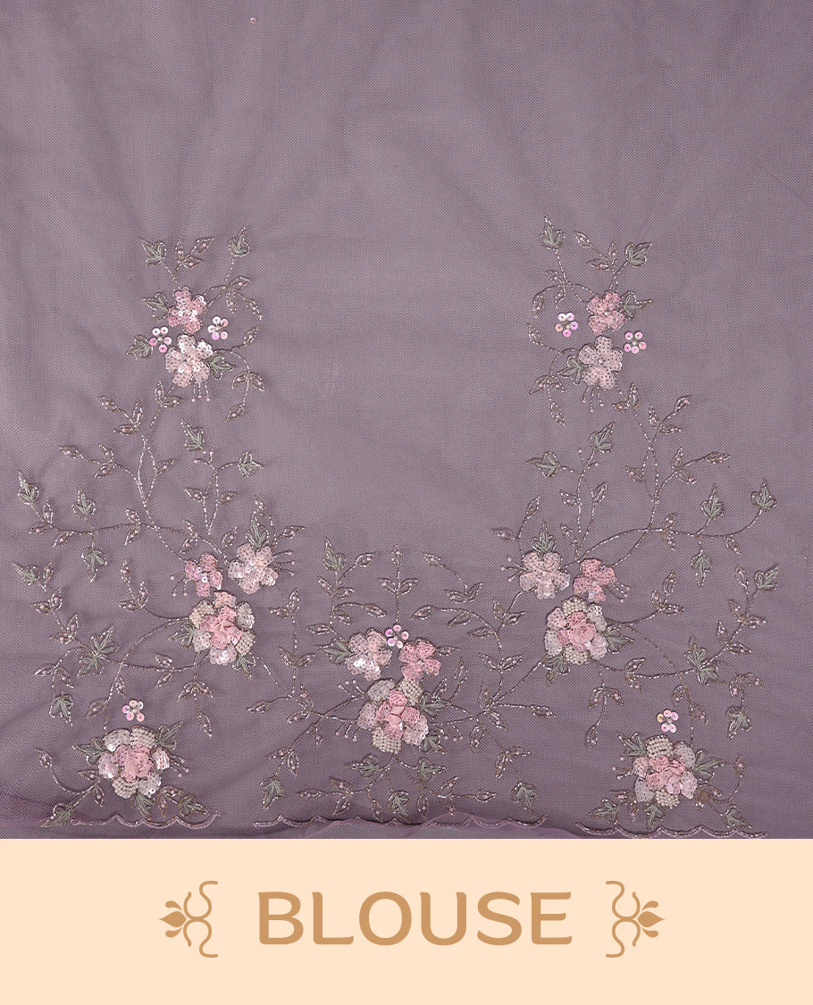 Lavender colour net designer saree featuring crisscross cut beads detailing on the body, adorned with beads and sequin worked floral kodi scallop border, paired with a matching worked blouse