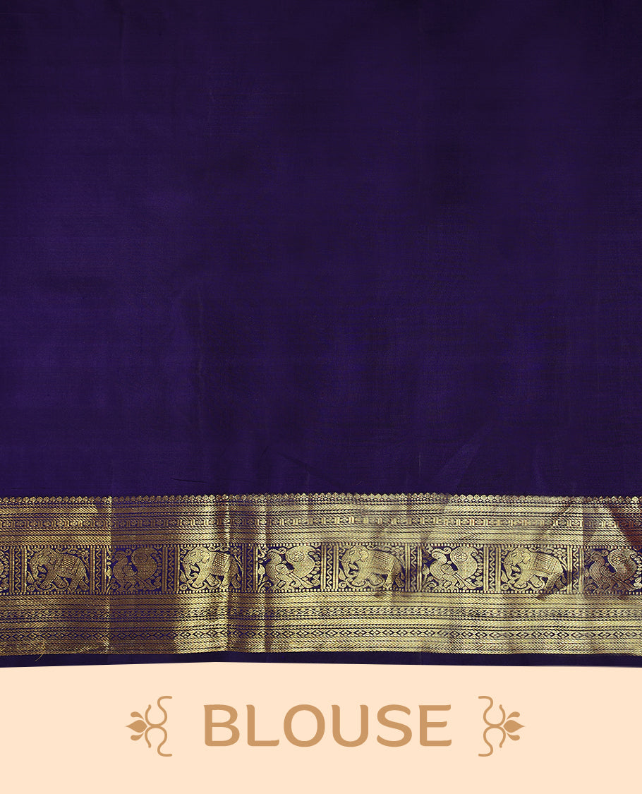 Navy blue Colour pure traditional Kancheepuram silk saree featuring antique zari line patterns on the body, complemented by a traditional border adorned with peacock and elephant motifs, and paired with a matching blouse.